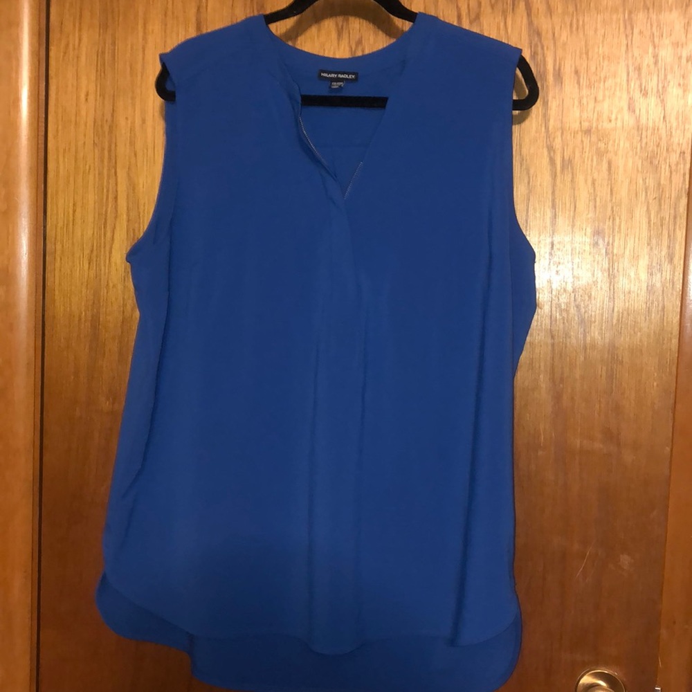blue sleeveless blouse